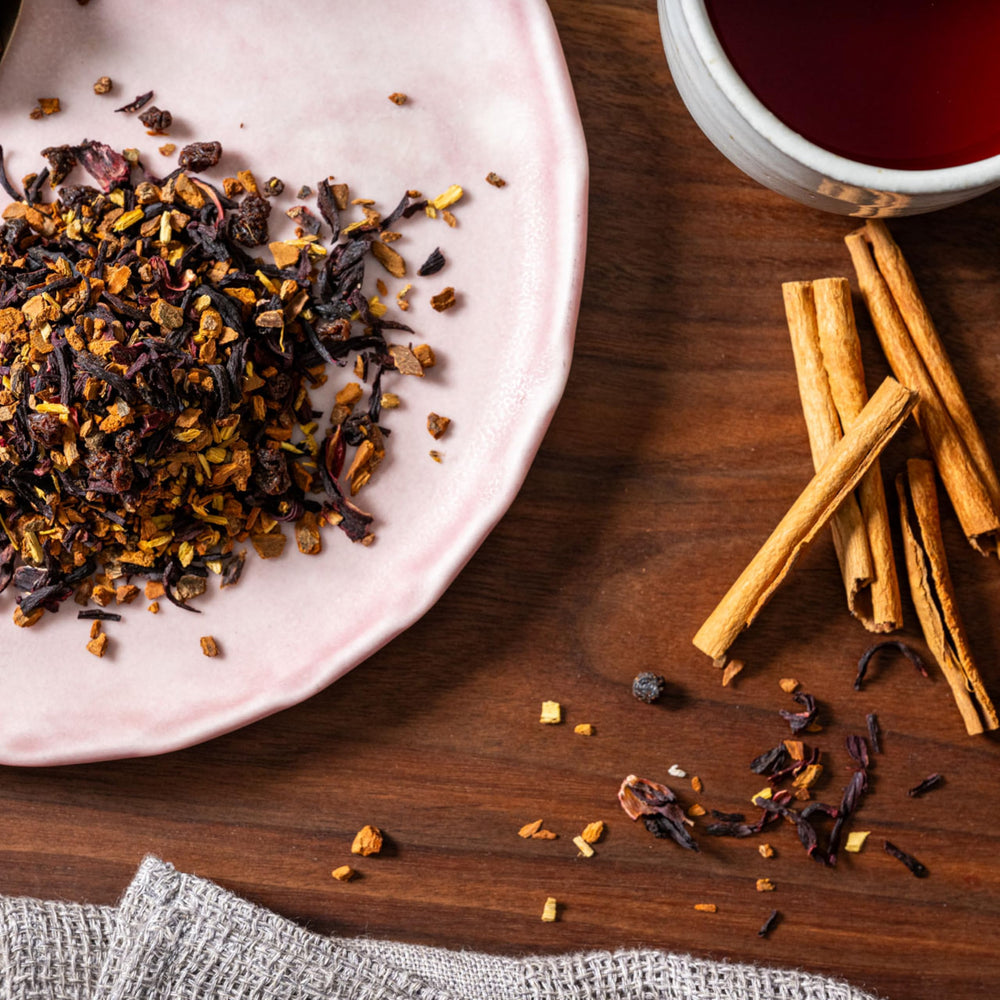 Rishi Cinnamon Plum tea steeped in a cup, ready to enjoy.