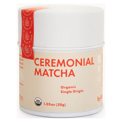 Rishi Tea ceremonial matcha tin with vibrant powder, ideal for whisking