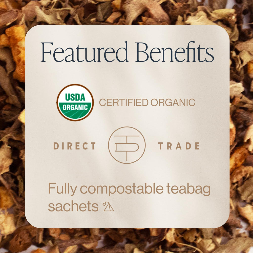 Rishi Tea Cinnamon Tulsi Spice cup with warm amber infusion, ideal as a caffeine-free evening ritual
