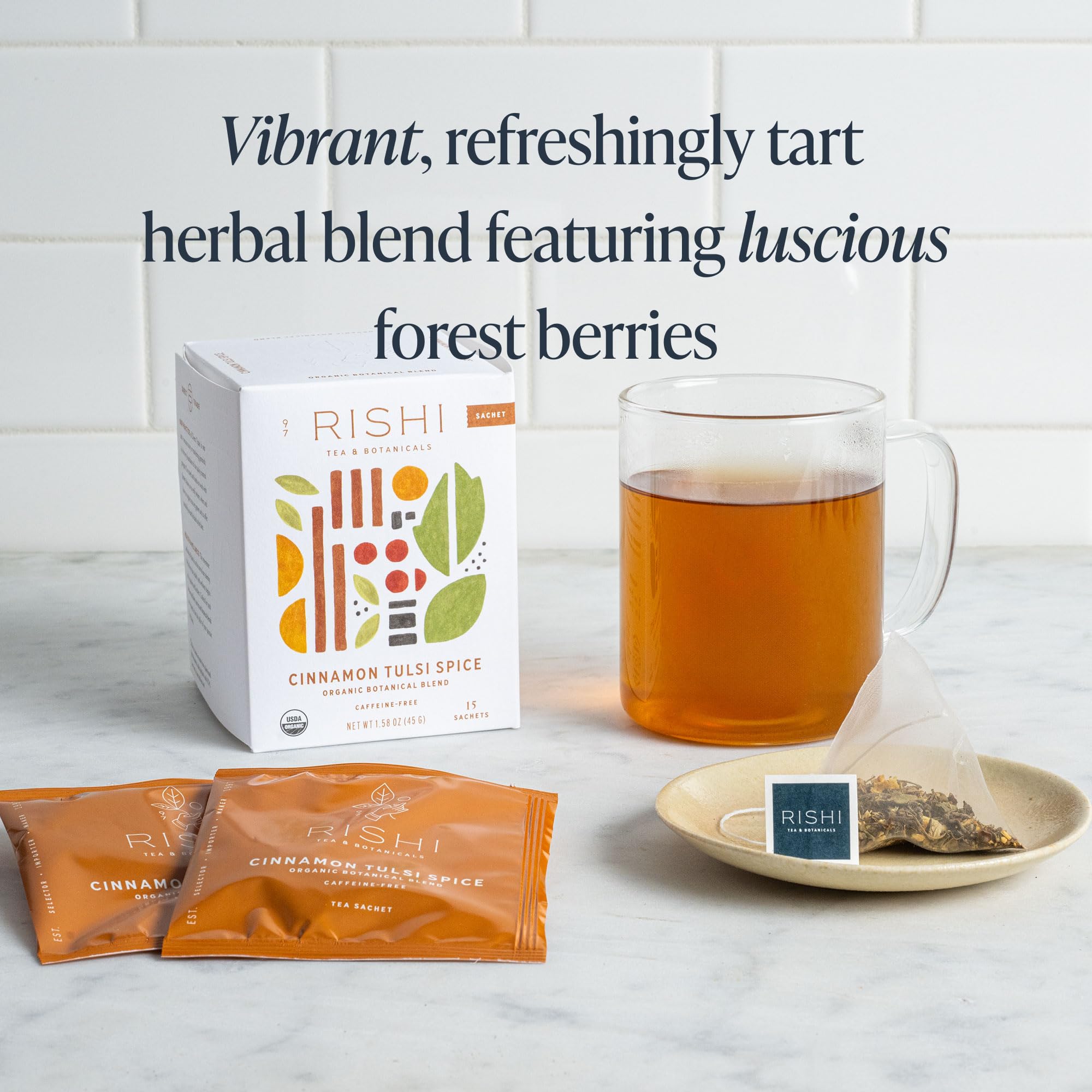 Rishi Tea Cinnamon Tulsi Spice packaging box highlighting organic and non-GMO credentials
