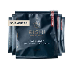 Rishi Tea Earl Grey tea bags packaging highlight organic, eco-friendly sachets.