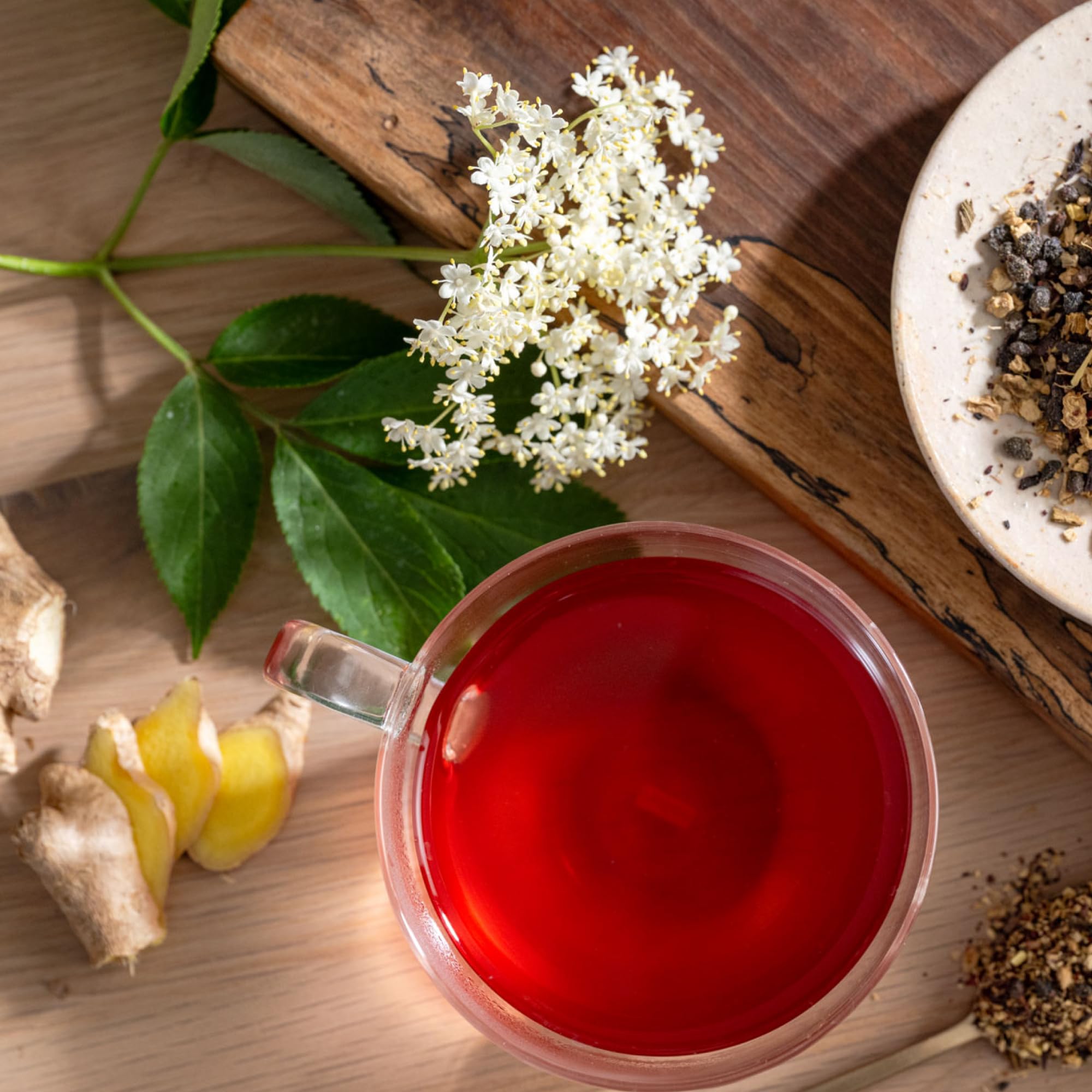 Rishi Tea Healthy Tea Ritual image conveys a gentle, wellness moment with elderberry blend