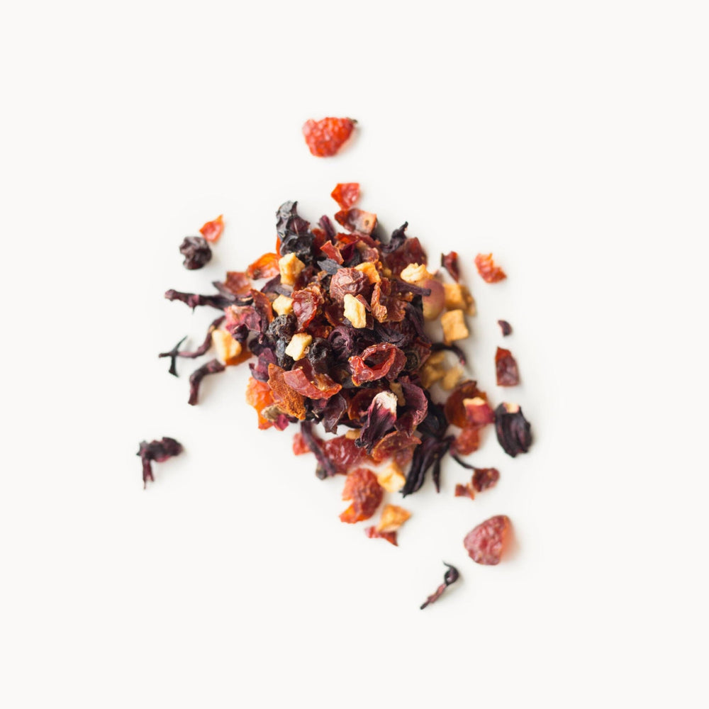 Rishi Tea Hibiscus Berry sangria-base suggests festive, fruity beverages over ice.
