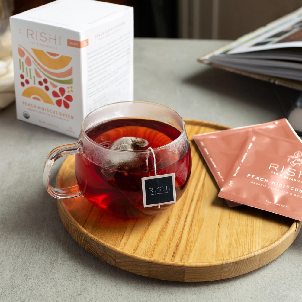 Rishi Tea Peach Hibiscus Green Houjicha ingredients shown as organic, gluten-free, dairy-free