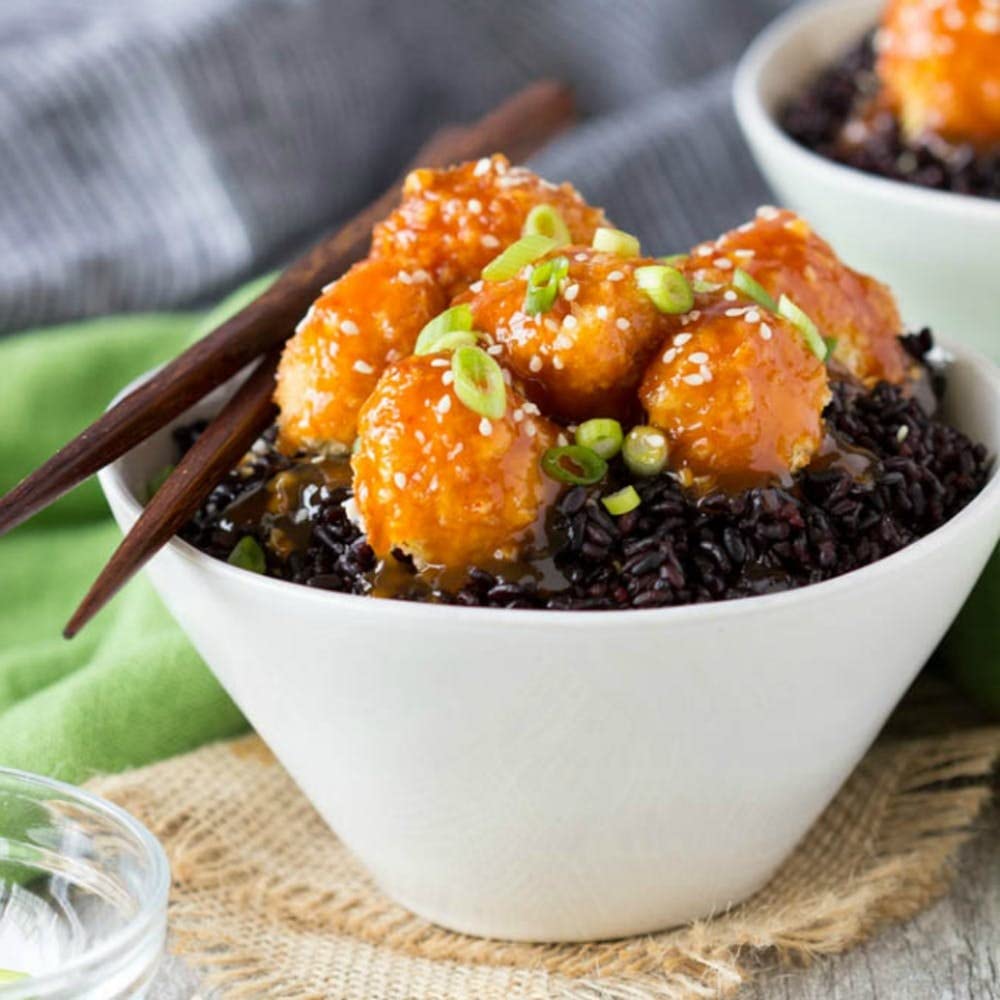 Riso Scotti Venere Black Rice cooking with mushrooms and herbs