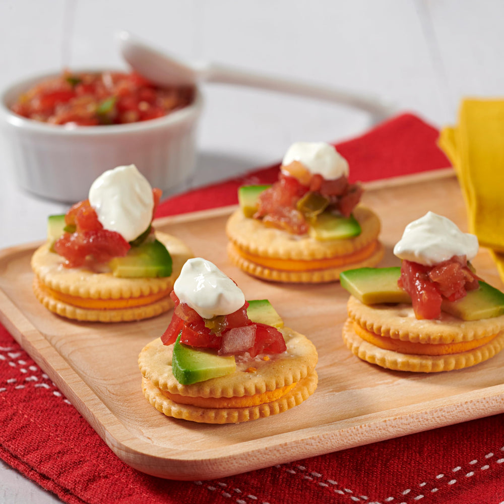 RITZ Cheese Sandwich Crackers cracker-sandwich closeup captures creamy center with crisp texture.