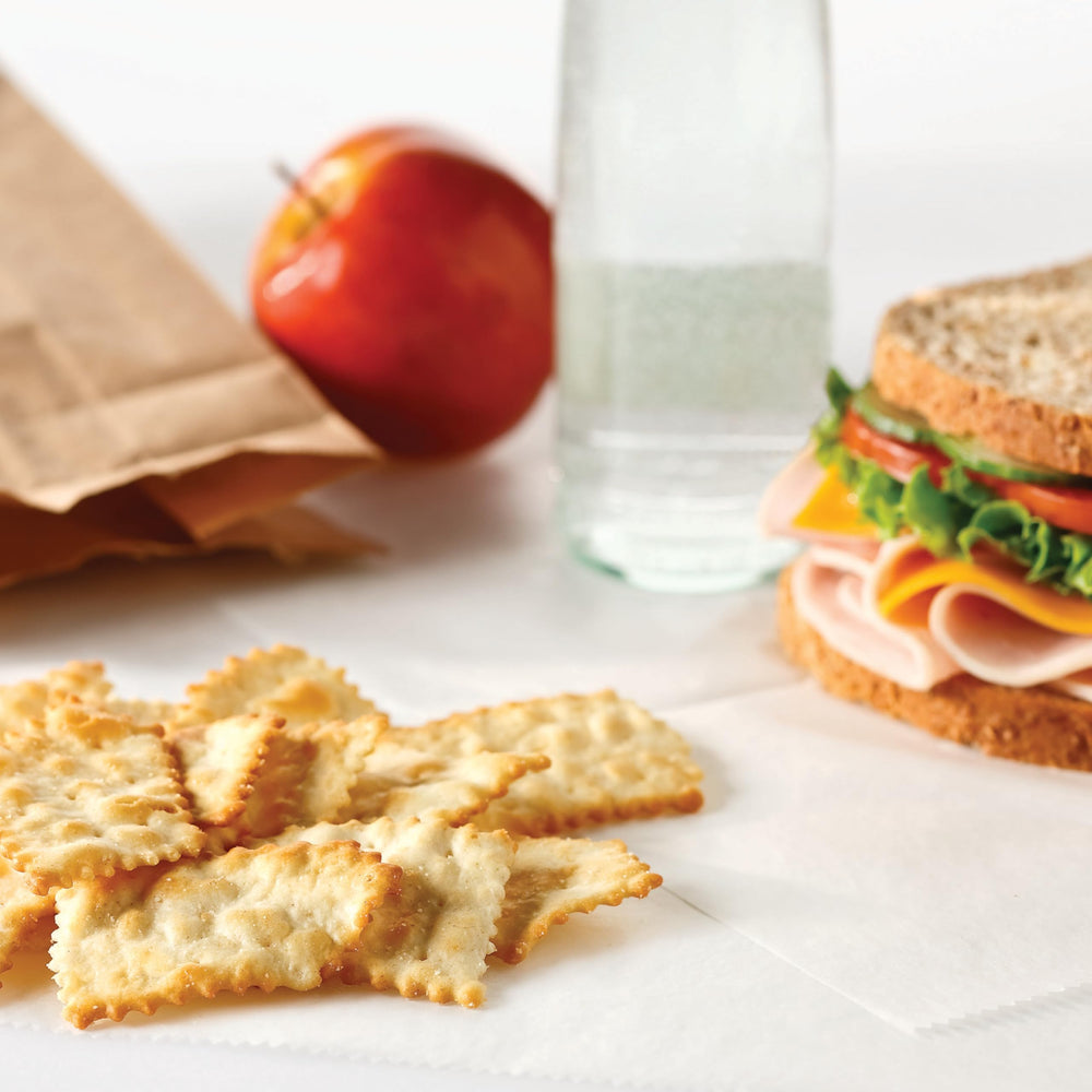RITZ Toasted Chips with dips on a platter, snack for gatherings.