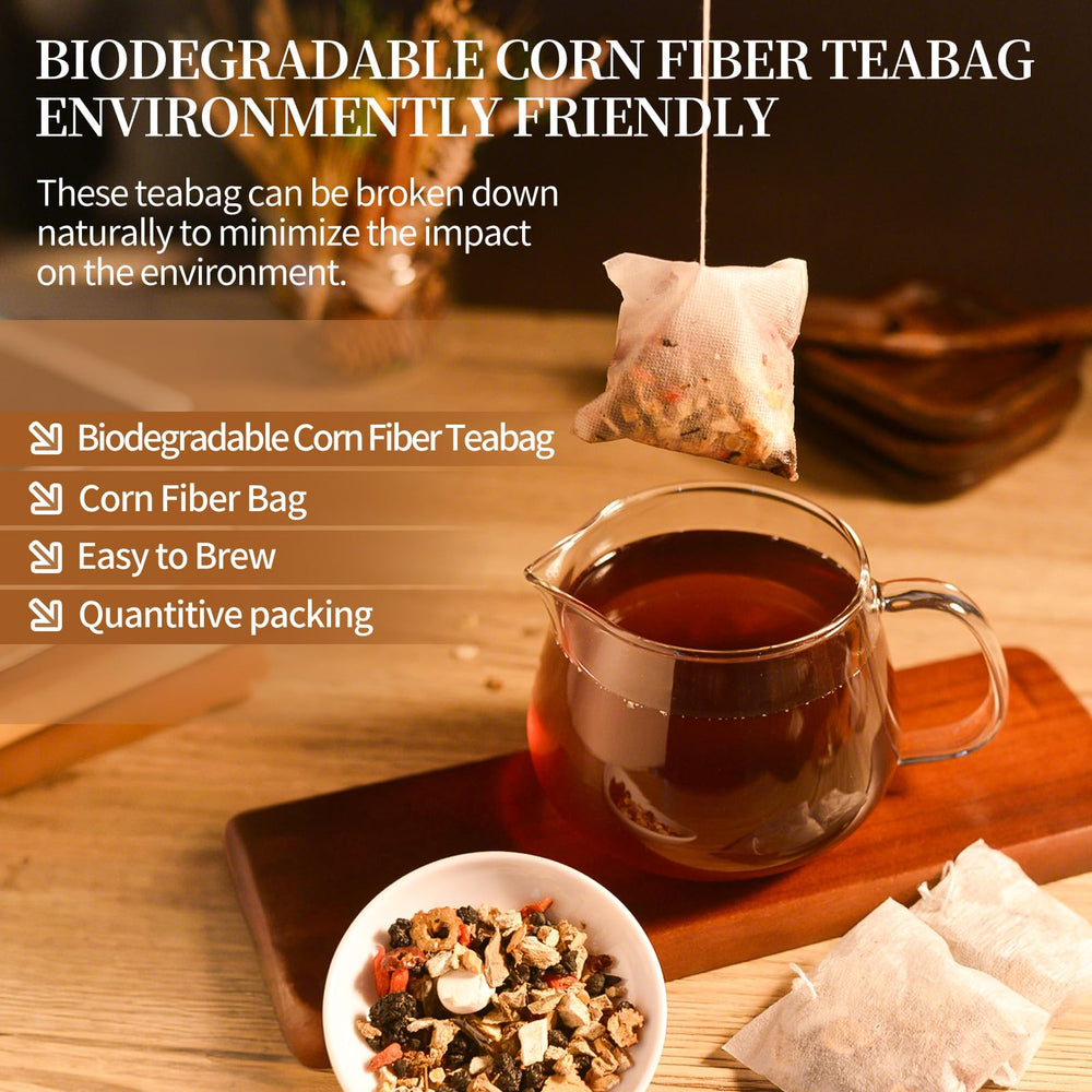 Tea bag steeping in hot water for a calming break with Rlvym tea.