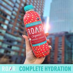 ROAR Organic packaging close-up emphasizes non-GMO and gluten-free hydration.