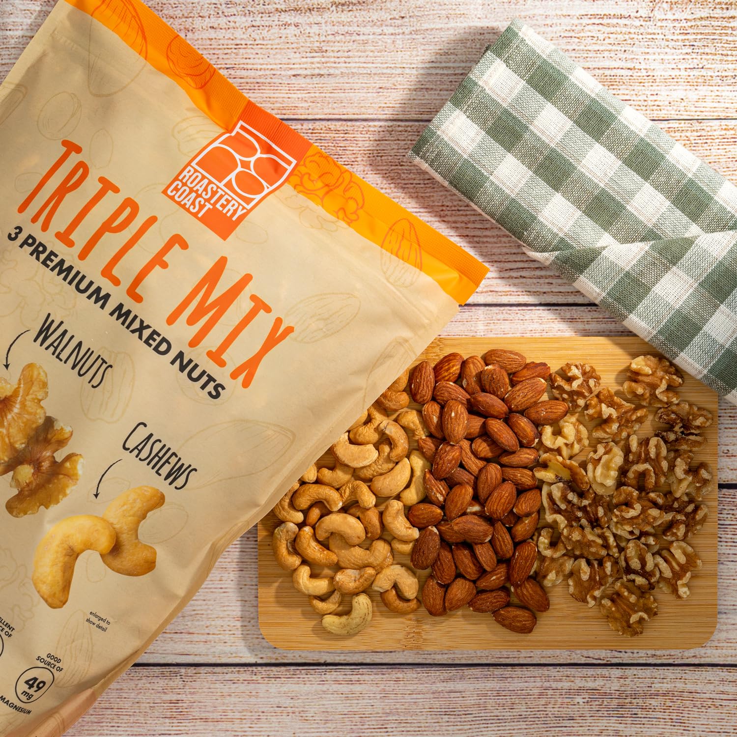Roastery Coast dry roasted nuts closeup highlighting almonds, cashews, walnuts with natural flavors.