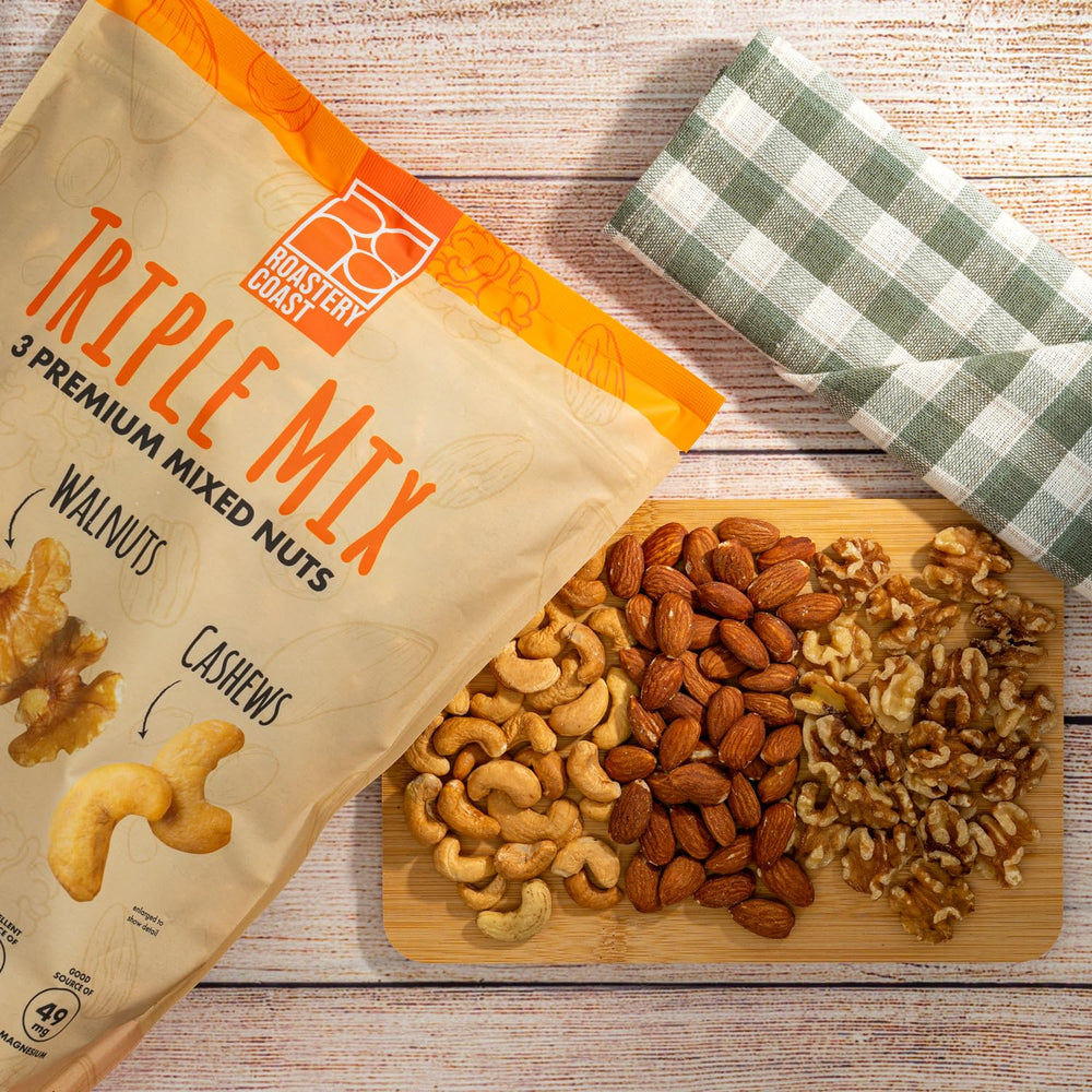 Roastery Coast dry roasted nuts closeup highlighting almonds, cashews, walnuts with natural flavors.