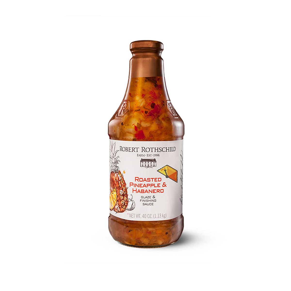 Robert Rothschild Farm Roasted Pineapple & Habanero glaze bottle pouring for grilling