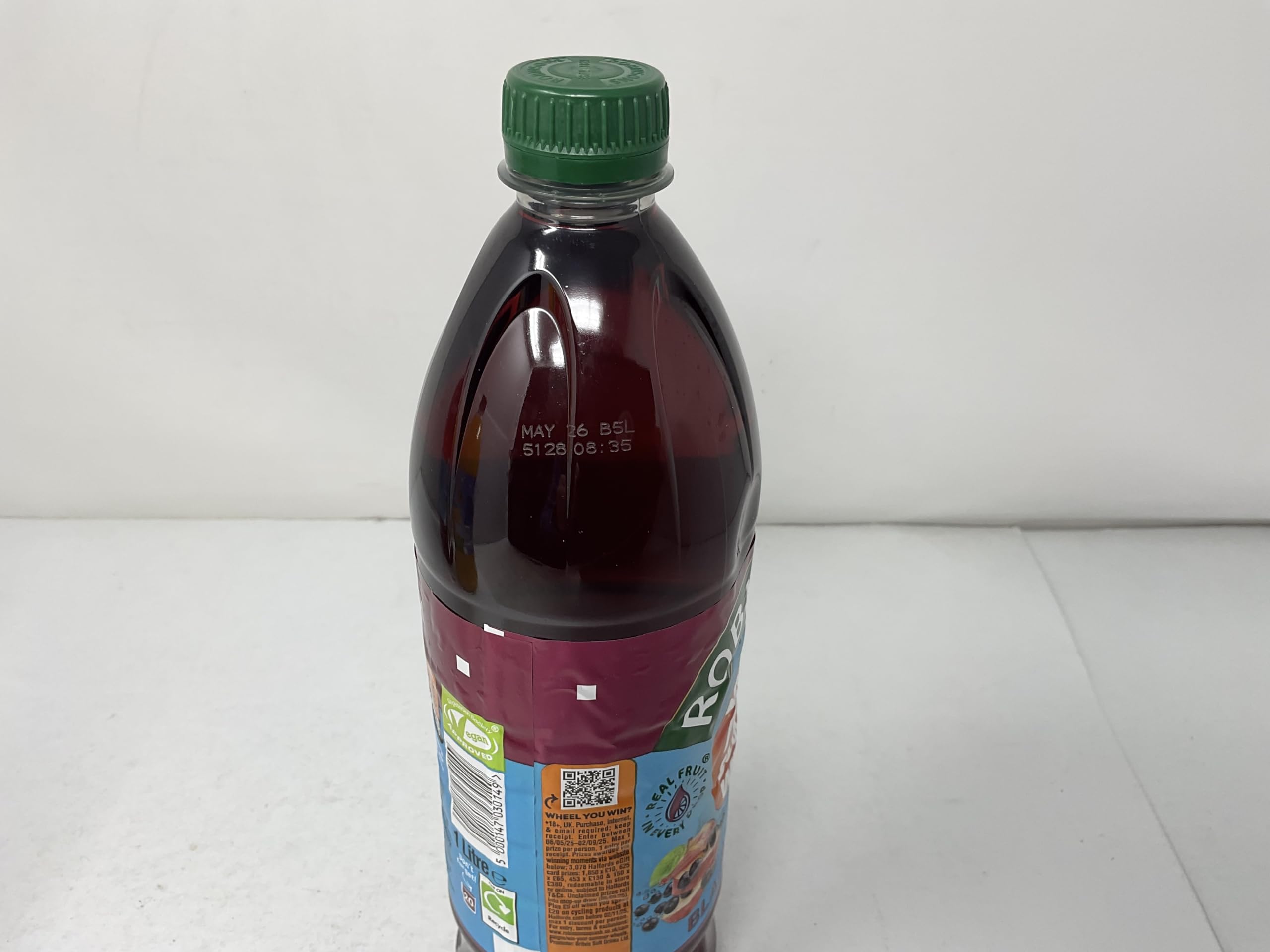 Robinsons No Added Sugar Fruit Squash bottle closeup showing branding
