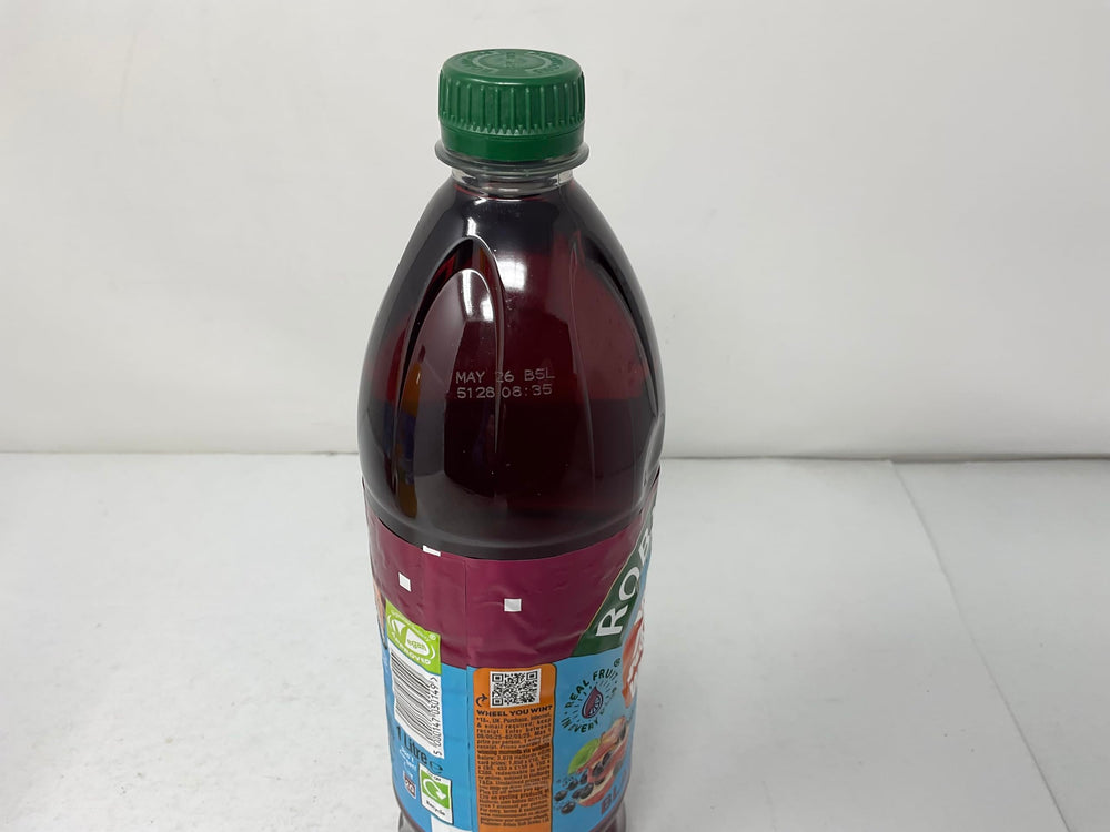 Robinsons No Added Sugar Fruit Squash bottle closeup showing branding
