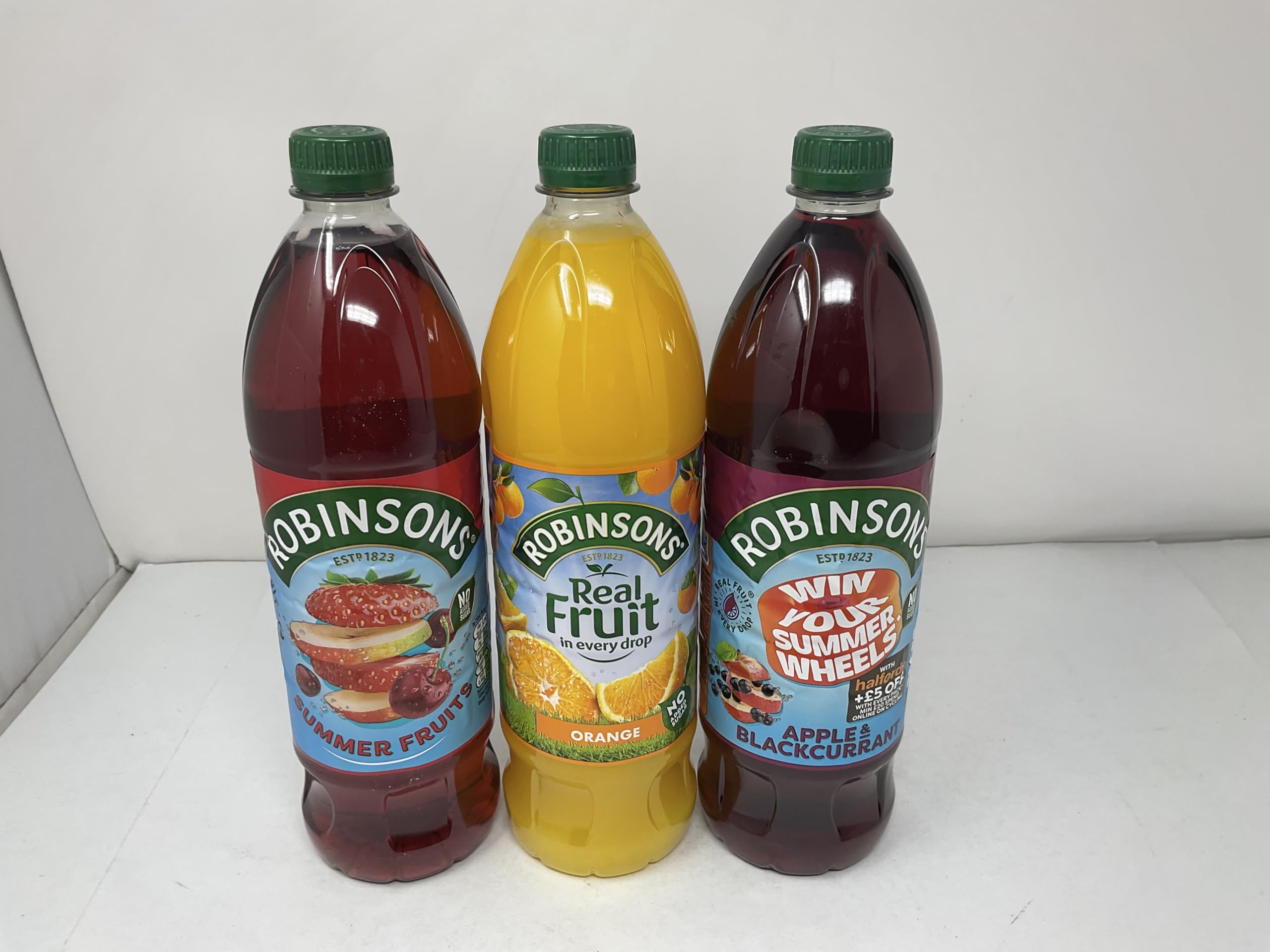 Robinsons No Added Sugar Fruit Squash 1L display bottle in store setting