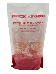 Rock the Food pink Himalayan salt bulk bottle showing natural crystals for gourmet seasoning