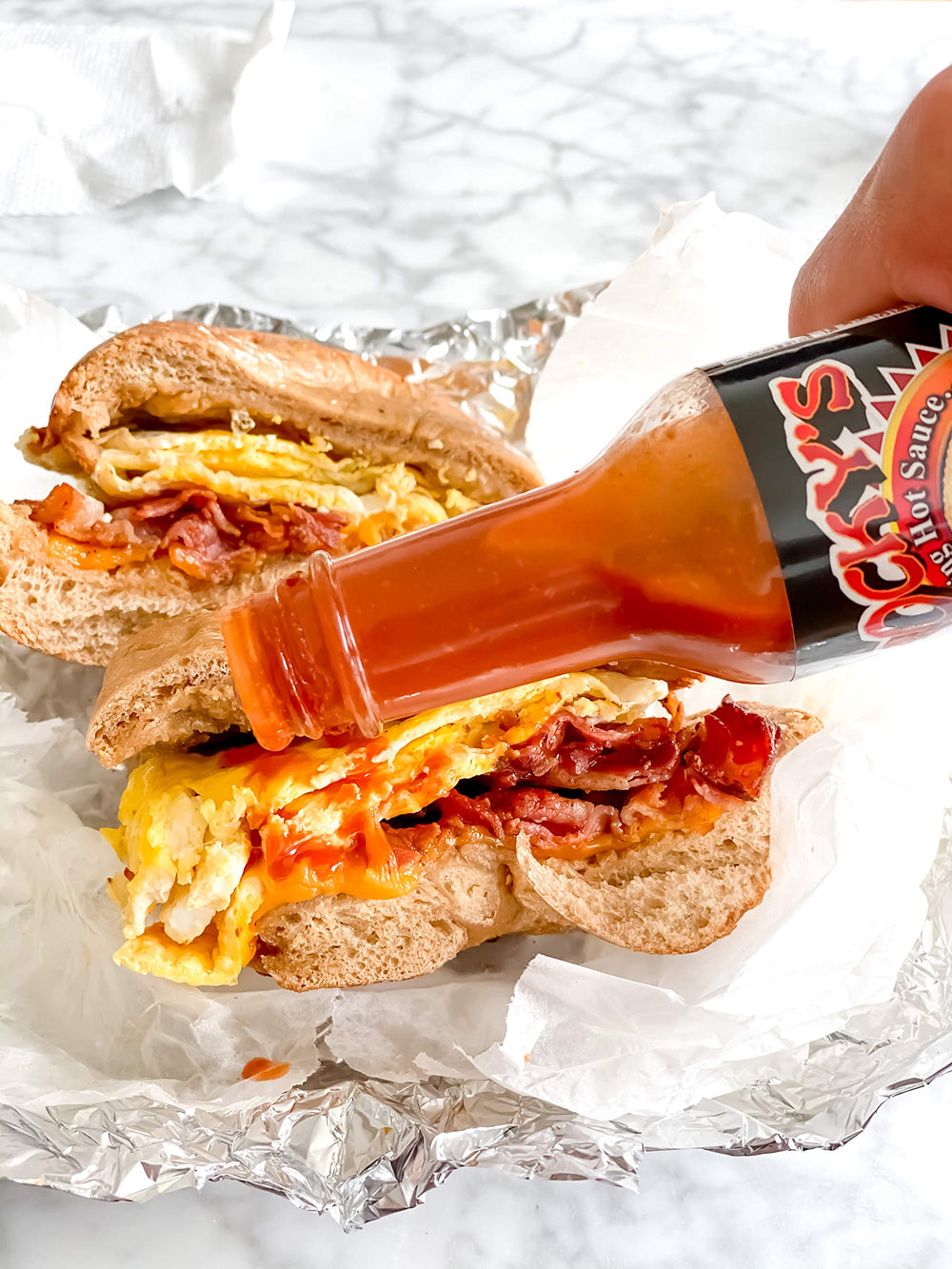 Rocky’s Bacon Hot Sauce label close-up highlighting balanced heat.
