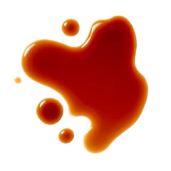 Roland Foods Black Vinegar pour in a glass suggests smoky, tangy notes for sauces.