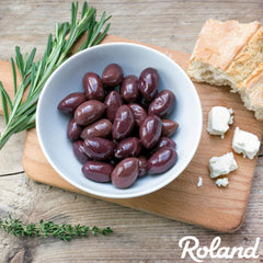 Roland Foods Kalamata olives on pizza highlight smoky, fruity notes and savory charm.