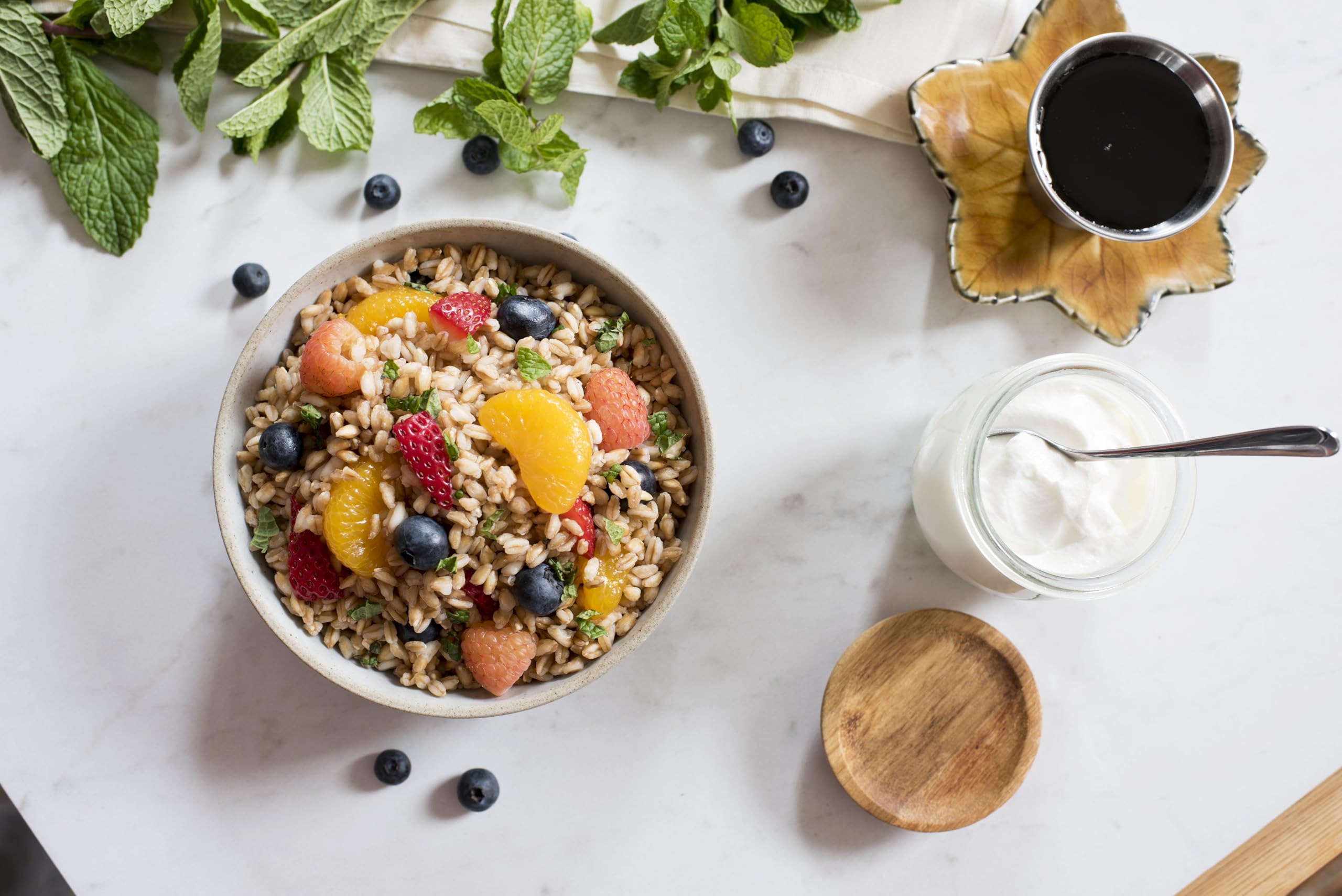 Roland Foods Pearled Farro grain bowl with colorful toppings and nuts