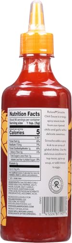 Roland Foods Sriracha bottle-pour enhances stir-fries with tangy heat.