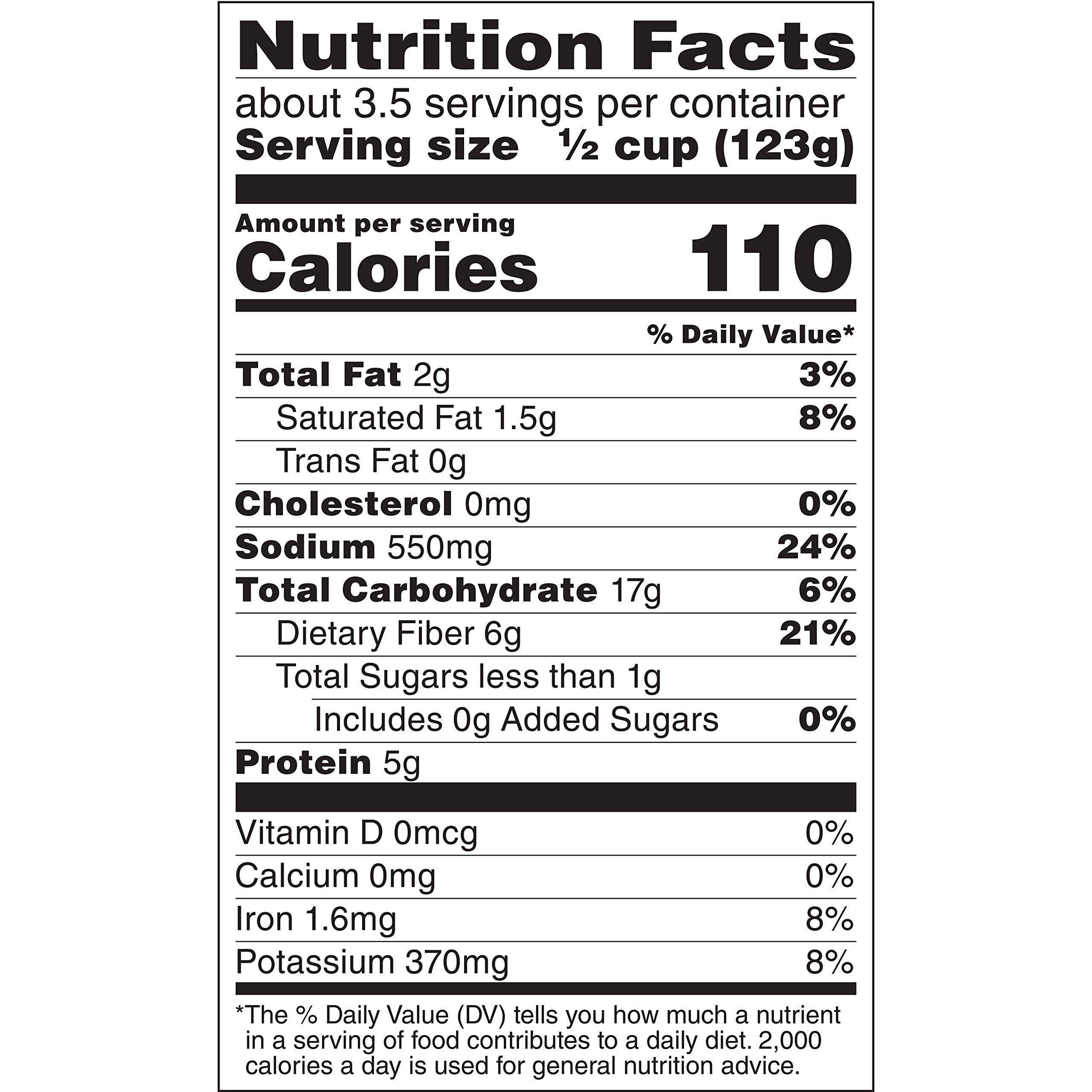 Cans of Rosarita Organic Refried Beans on shelf, a convenient pantry staple for quick meals.