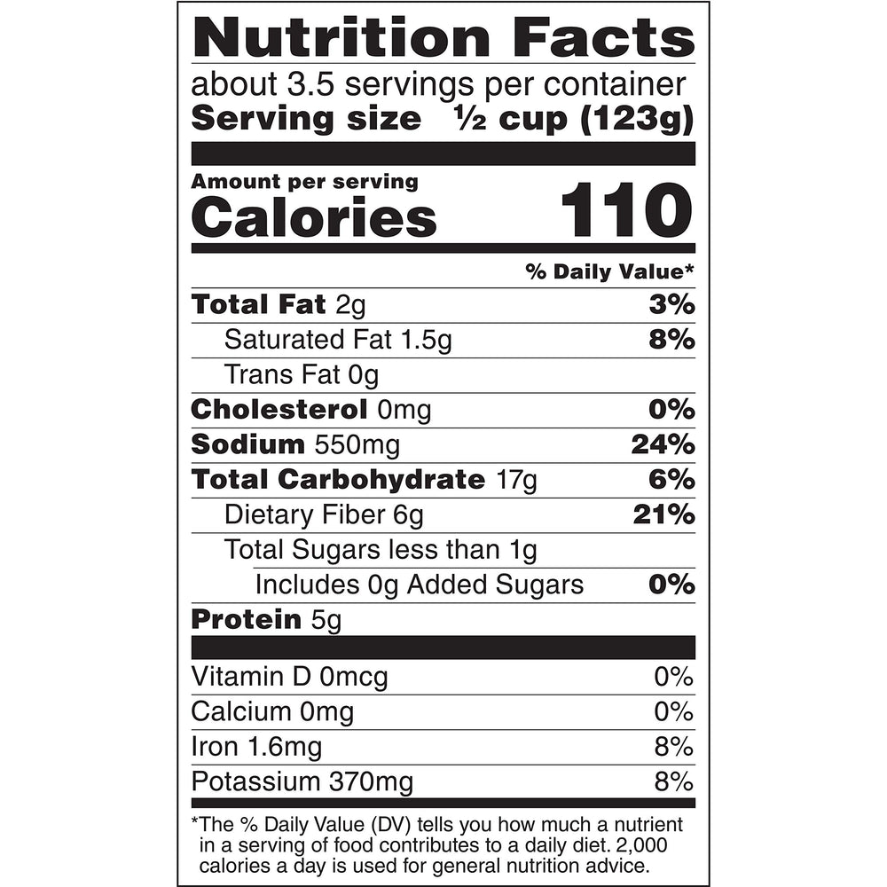Cans of Rosarita Organic Refried Beans on shelf, a convenient pantry staple for quick meals.