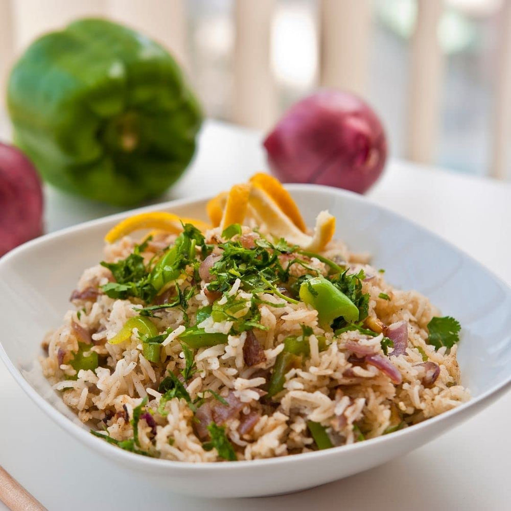 Rose Hill FlavoRice kitchen scene depicting quick, flavorful side