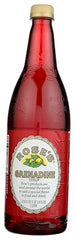 Rose's Grenadine bottle pours into a shaker for vibrant drinks.