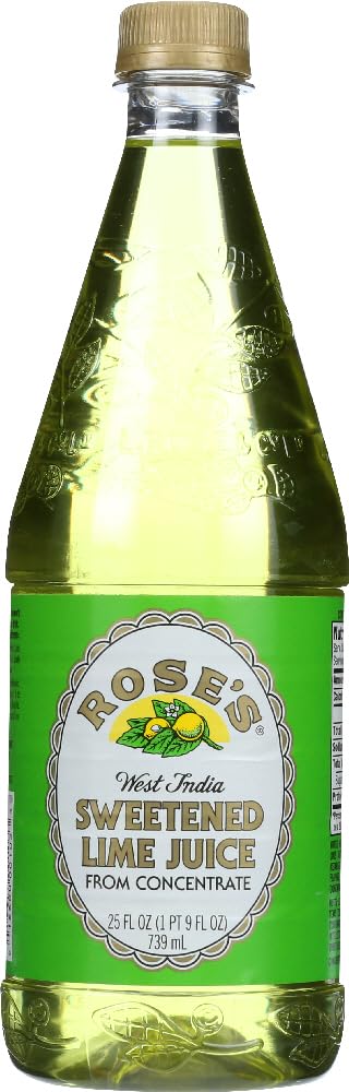 Pouring Rose's West India Lime Juice into a glass for mixed drinks and mocktails.
