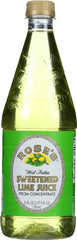 Pouring Rose's West India Lime Juice into a glass for mixed drinks and mocktails.