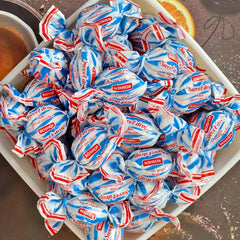 Close-up of Roshen Sweet Drop milky filling with caramel shell