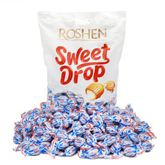 Roshen Caramel Sweet Drop milky filling close-up highlights creamy texture for indulgence.