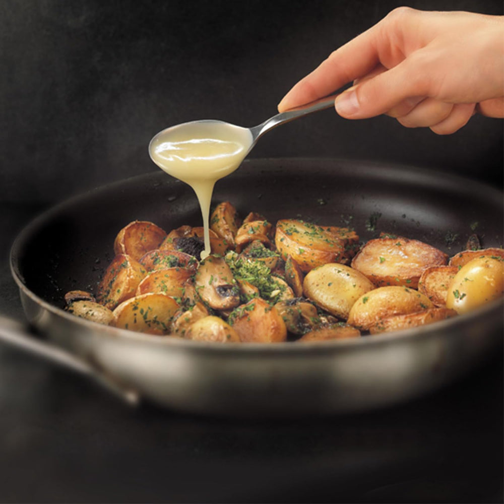 Searing meat with Rougie duck fat for bright, full flavors.