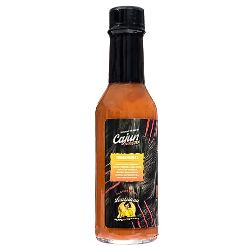 Rouxgaroux juice hot sauce pours smoothly for heat and depth