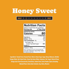 Pouring Rufus Teague Honey Sweet over ribs for a glossy finish.
