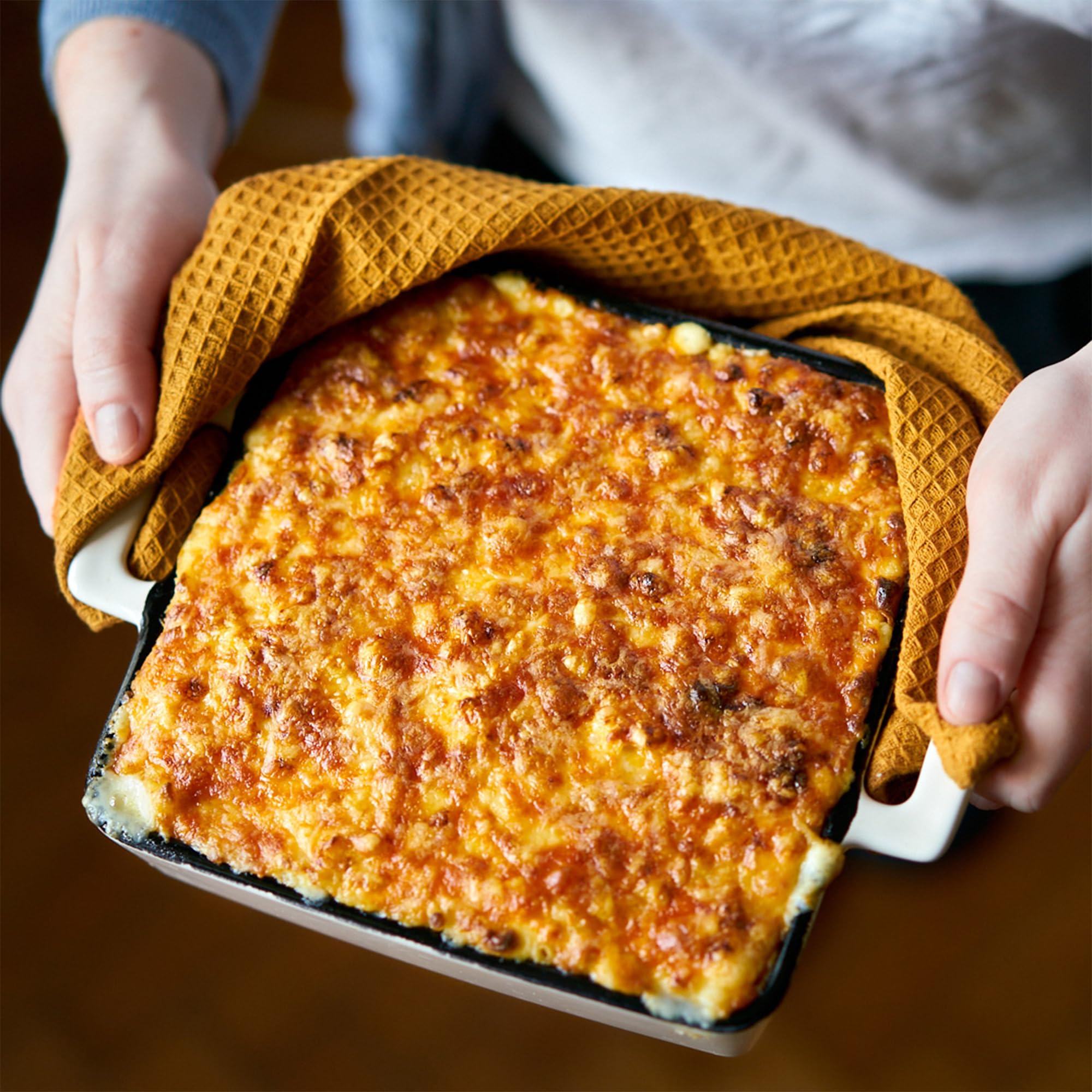 Rummo gluten-free elbows served with macaroni and cheese, creamy sauce clinging nicely.