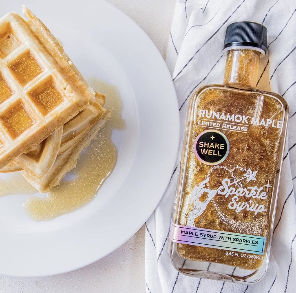 Packaging of Runamok Sparkle Syrup in a sunny Vermont kitchen.