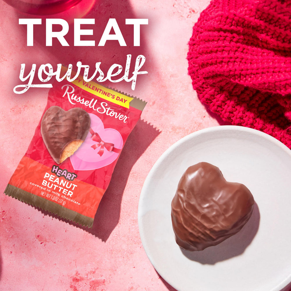 18-pack pack of Russell Stover Valentine hearts for parties.