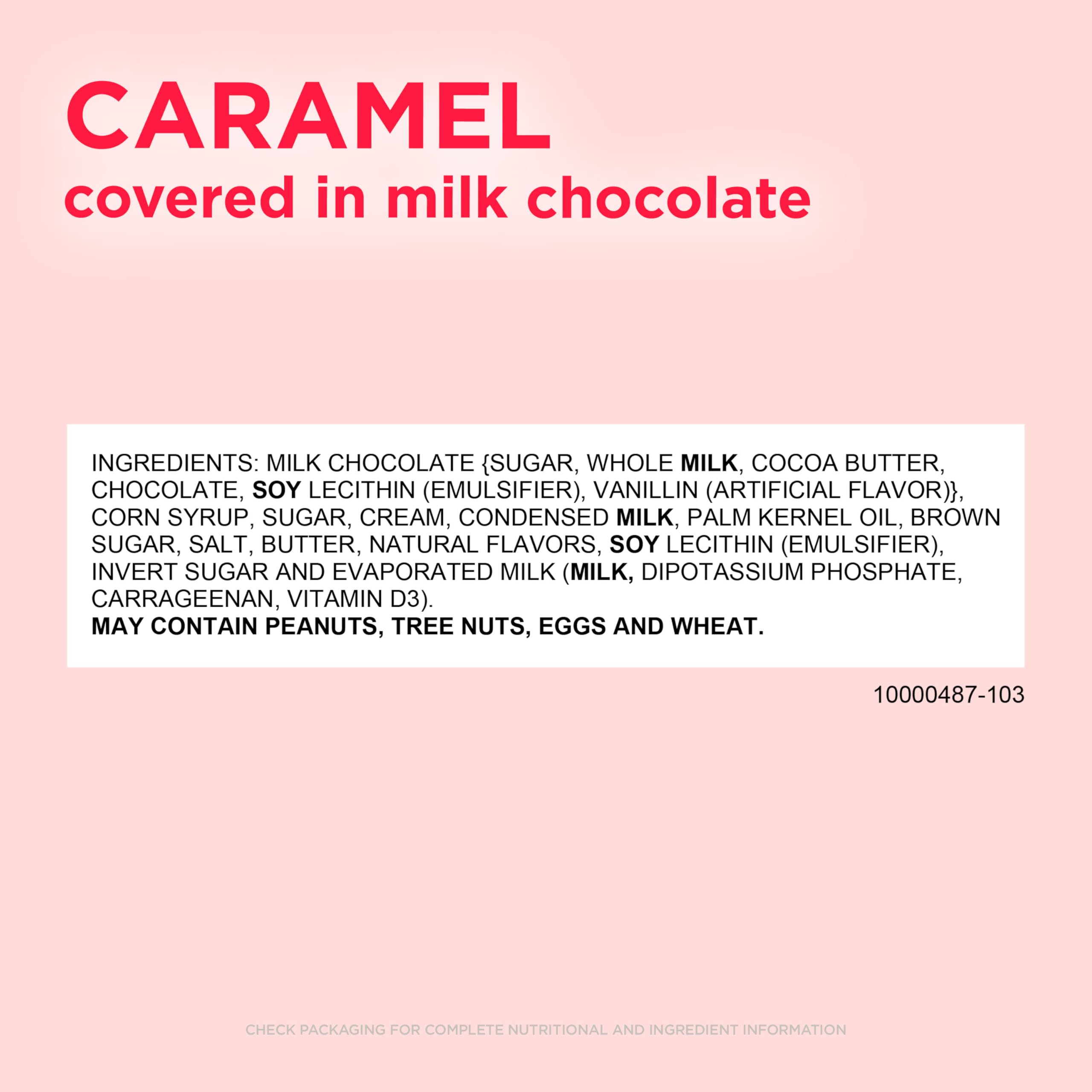 Close-up of caramel center inside a glossy milk chocolate heart.
