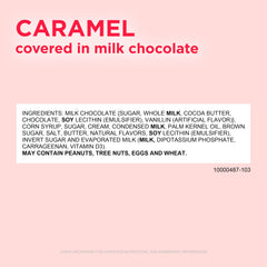 Close-up of caramel center inside a glossy milk chocolate heart.