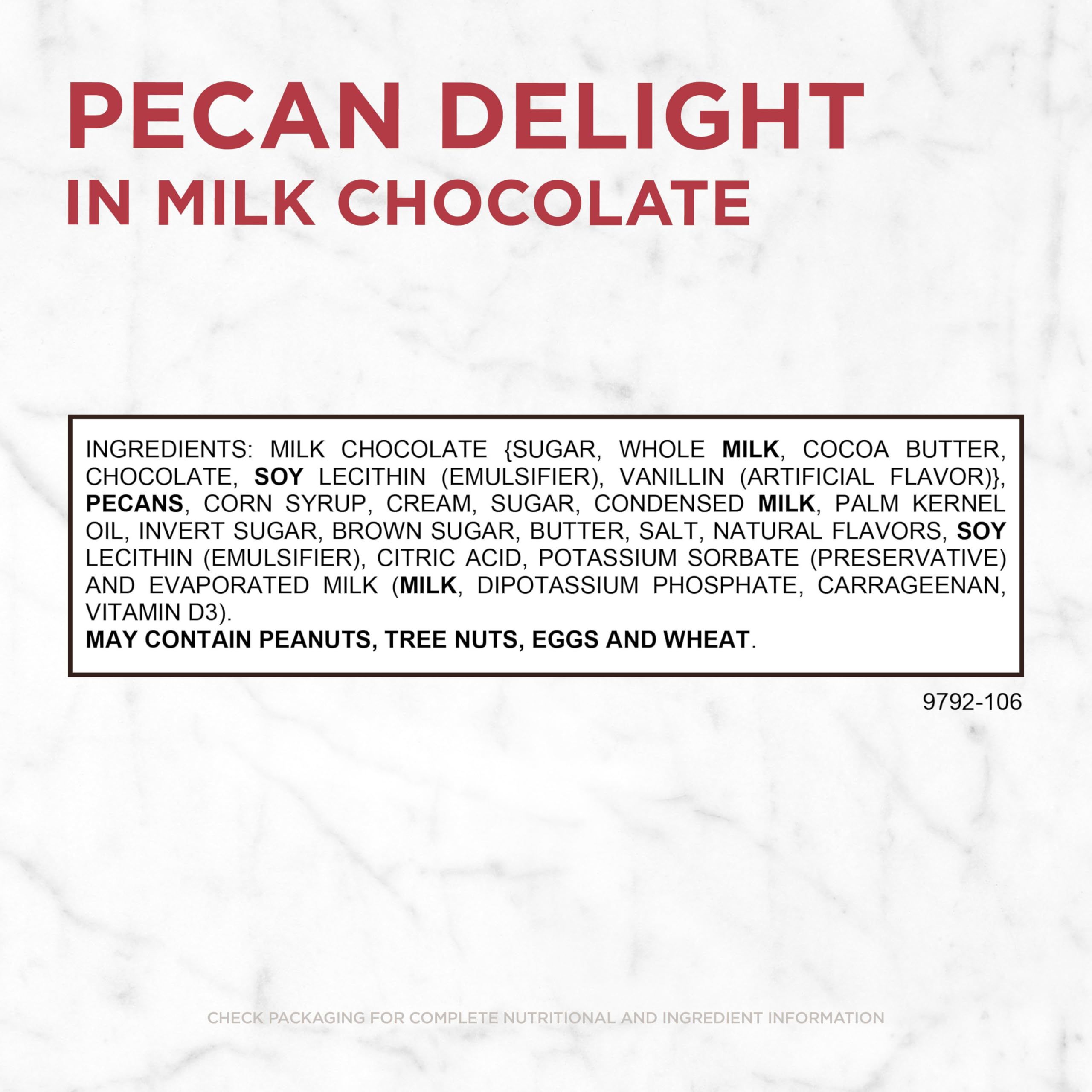 Russell Stover milk chocolate-dipped pecans in glossy coating.