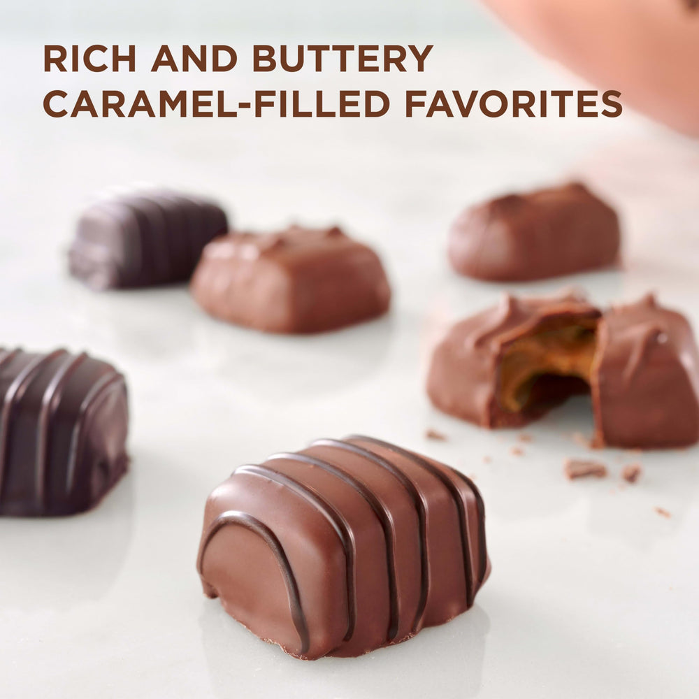 Russell Stover milk-chocolate peanut caramel close-up, nutty bite