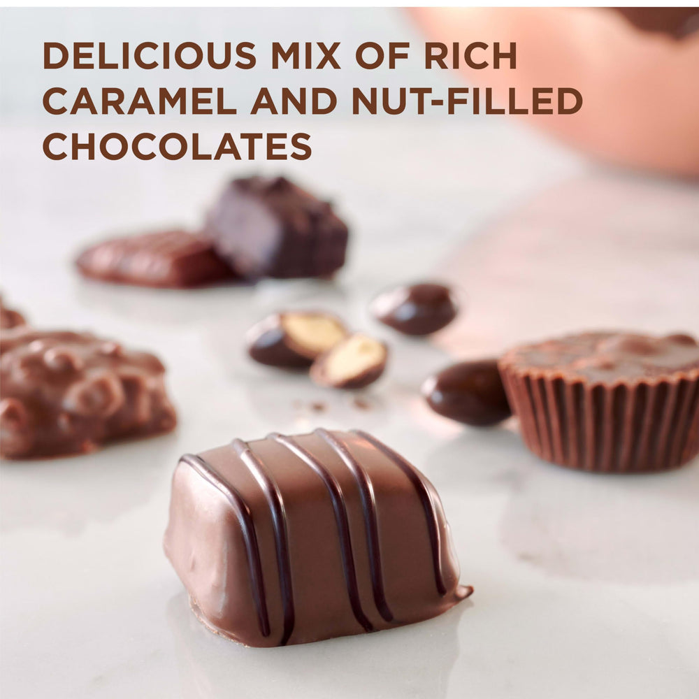 Milk chocolate toffee pieces in the Russell Stover box.
