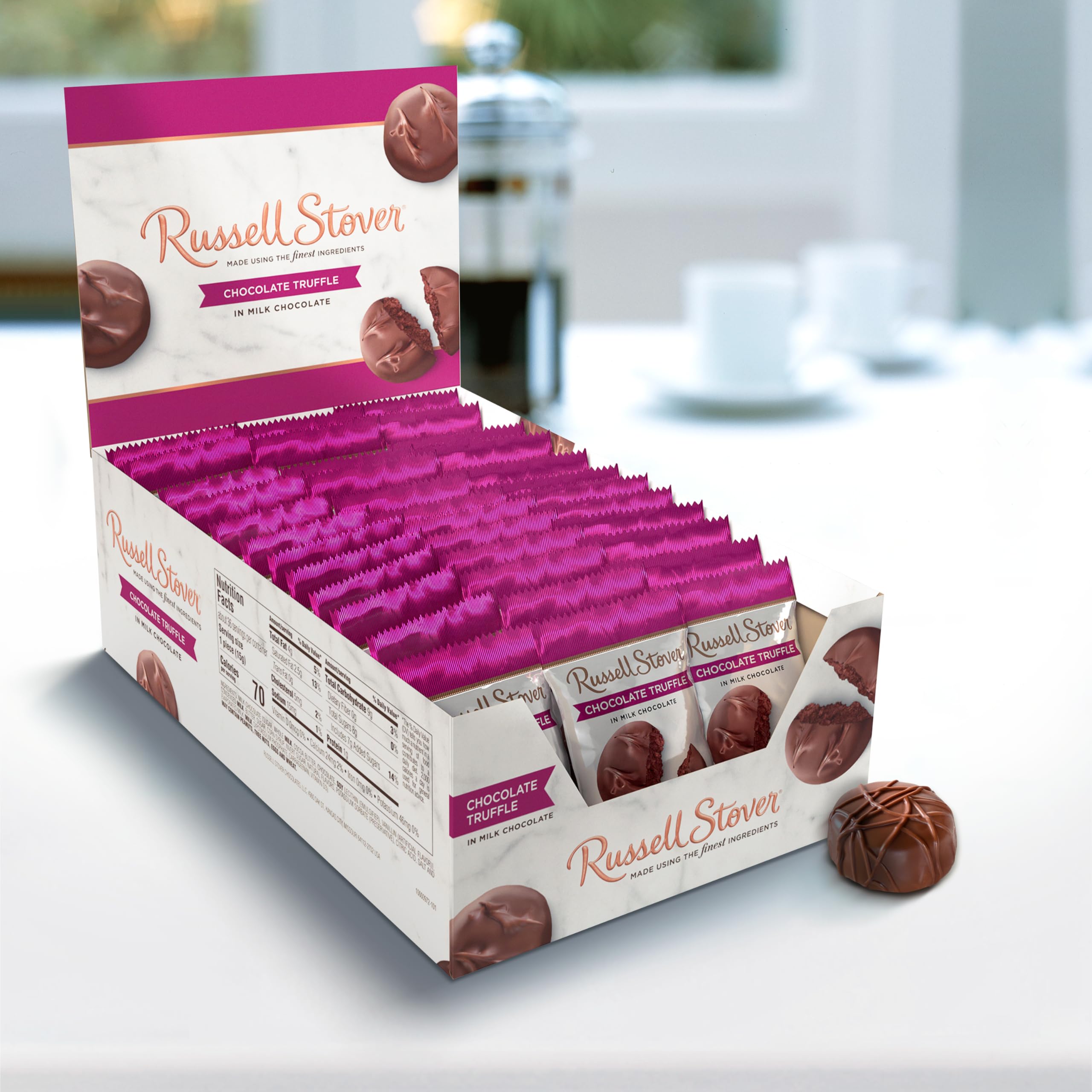 Russell Stover milk chocolate truffles complement coffee or tea.