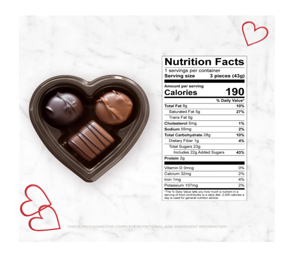Russell Stover heart box interior showing three chocolates, perfect for sharing.