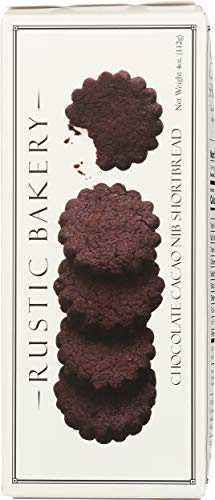 Rustic Bakery chocolate cocoa nib cookies on plate with coffee