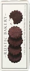 Rustic Bakery chocolate cocoa nib cookies on plate with coffee