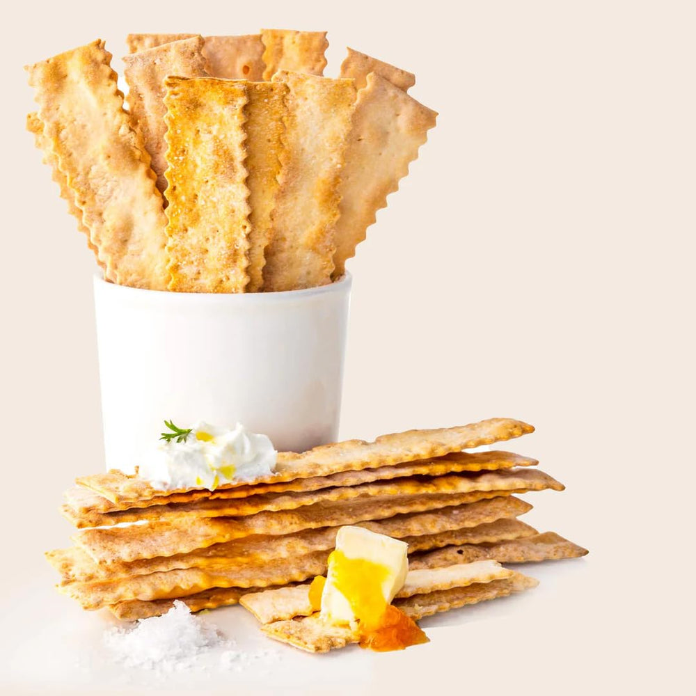 Rustic Bakery crackers with hummus dip for snacking