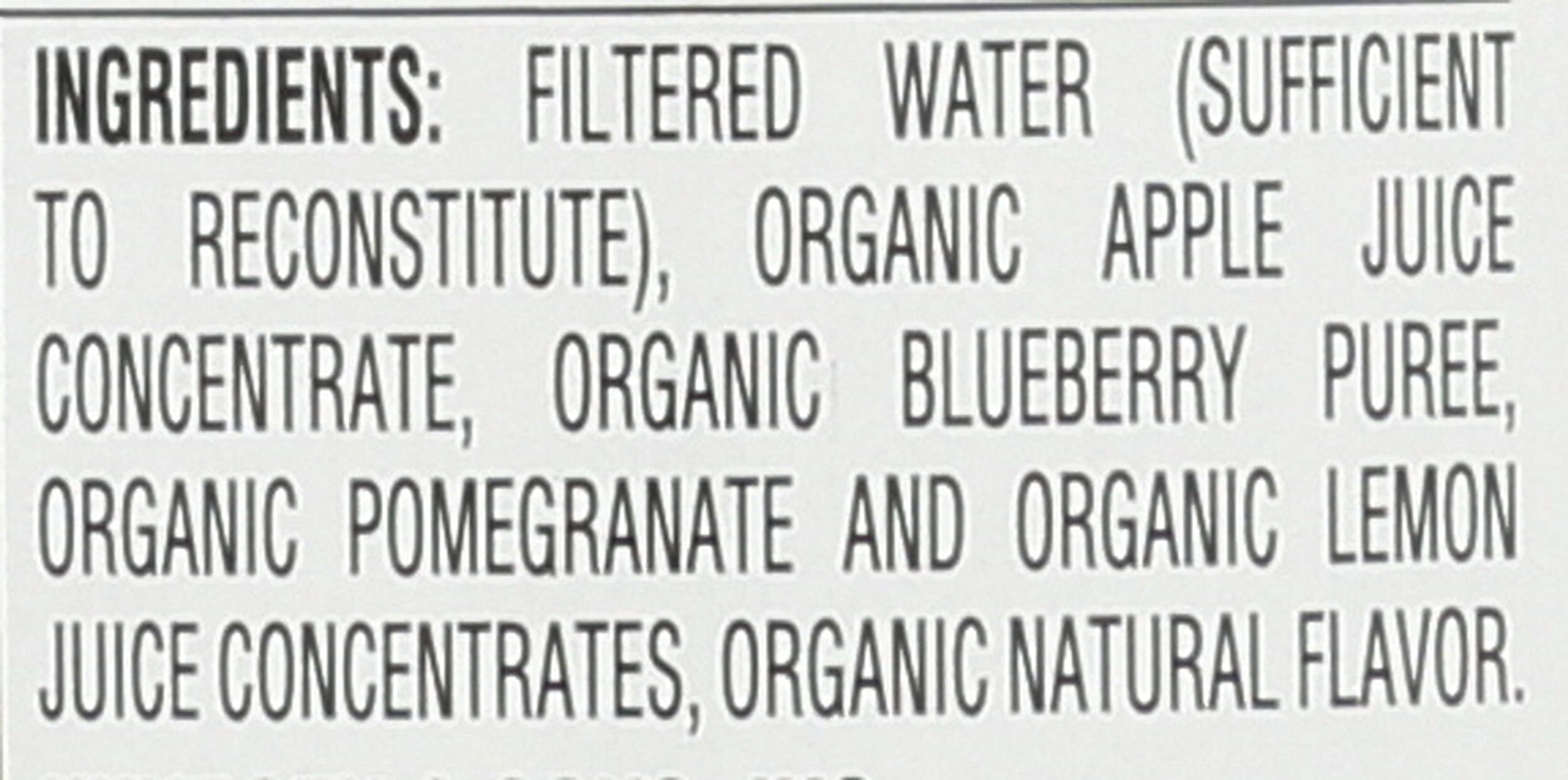 Close-up of R.W. Knudsen organic label highlighting non-GMO and no added sugar.